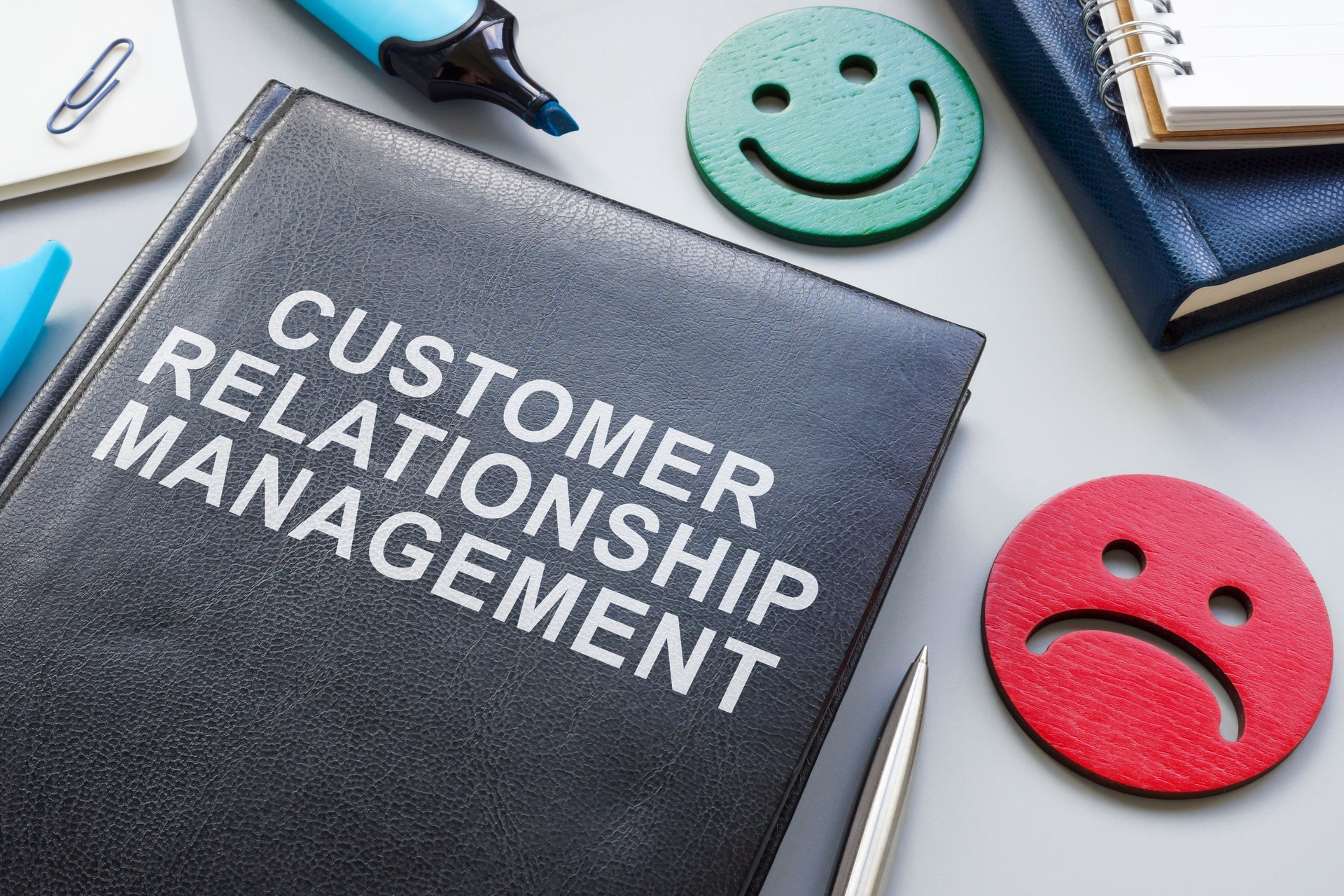 Customer relationship management book and smiles.
